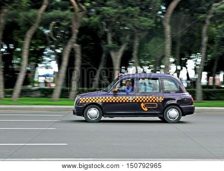 BAKU AZERBAIJAN - SEPTEMBER 25: Cab taxi in the street of Baku on September 25 2016. Baku is a capital and largest city of Azerbaijan.