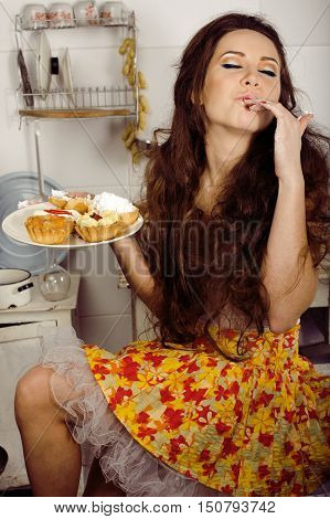 crazy real woman housewife on kitchen, eating perfoming, bizare girl halloween dress