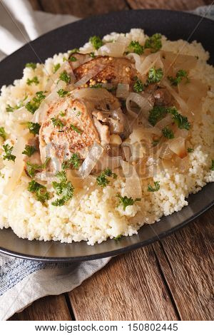 Senegalese Cuisine: Chicken Yassa With Couscous And Onions Close-up. Vertical