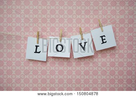 White Sheets Of Paper On A Pink Background, White Sheets On Clothespins