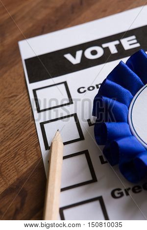 Blue Political Rossette On Ballot Paper For Election