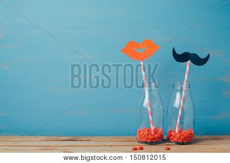 Valentine's day creative romantic background with retro bottles and strows