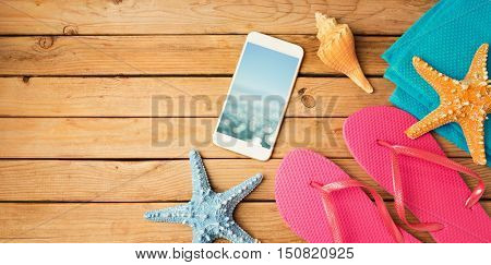 Smartphone mock up template with summer beach items. View from above. Flat lay