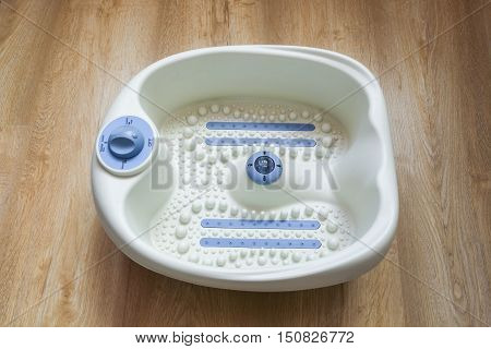 Electric massage foot bath. Relax after work.