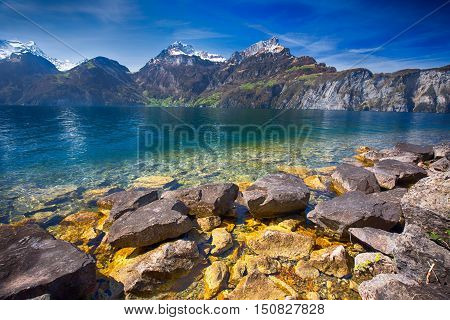 View to Swiss Alps and Lucerne lake from Sisikon village Switzerland