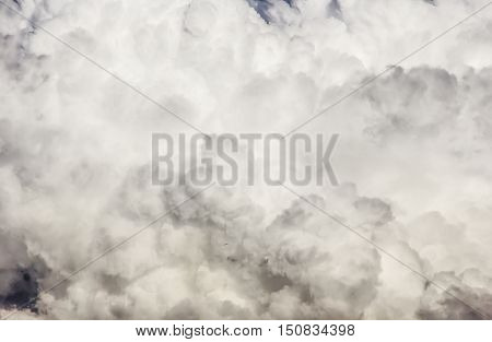 High detail fluffy cumuli cloud textured background