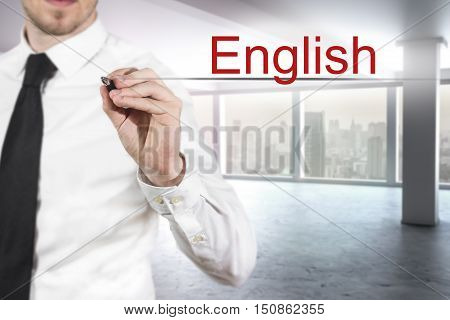 businessman translator in office writing english in the air