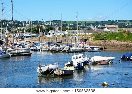 AXMOUTH, UNITED KINGDOM - JULY 18, 2016 - Yachts and fishing boats moored in the harbour Axmouth Devon England UK Western Europe, July 18, 2016.