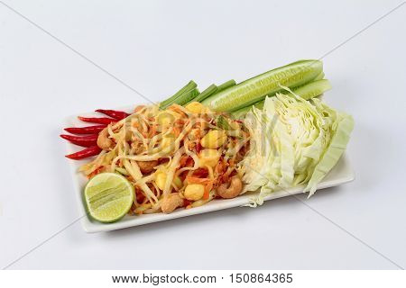 Spicy papaya salad with mixed vegetable call "Som Tum J" is organic food served.