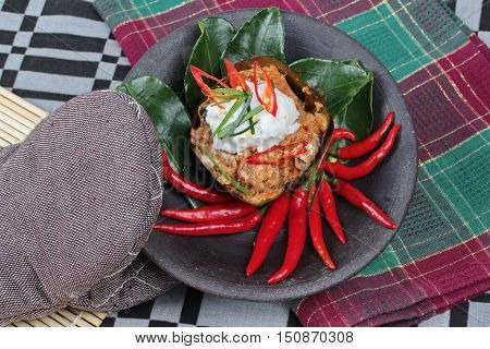 Streamed vegetable curry in banana leaf cup call 