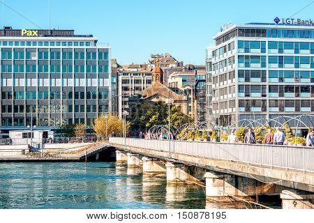 Geneva, Switzerland - June 23, 2016: Bergues pedestrian bridge in the center of Geneva city. Geneva is a financial center and worldwide center for diplomacy in Europe