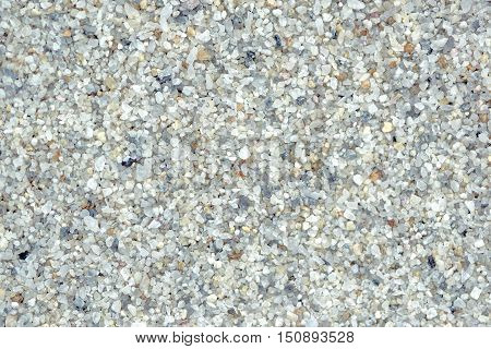Quartz sand abstract texture as background macro view of grainy surface
