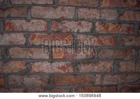 old brick wall with old red brick