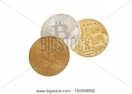 Three bitcoin coins gold silver and bronze isolated on white