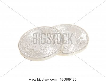 Silver Bitcoin coins isolated on white background