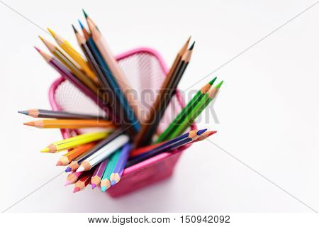colored pencils and sharp in penholder blurred