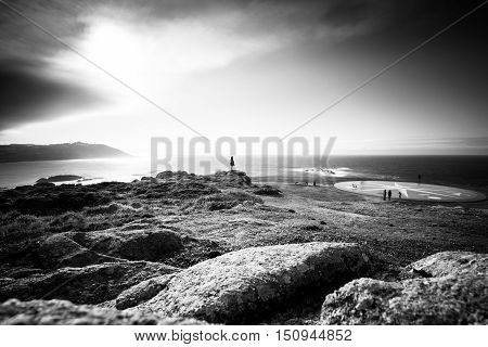 Giant wind rose on the edge of the coast spotted by a person from the top of a peak