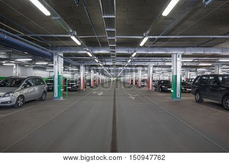 A subterranean car park in a shopping mall