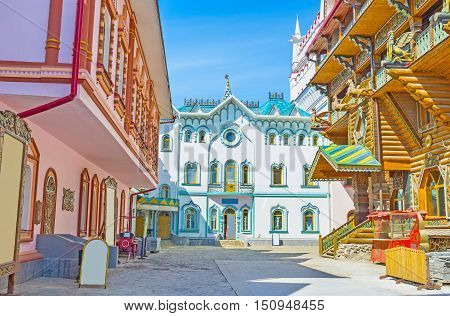The scenic colorful mansions of different stores museums and craft centers of Izmailovsky Kremlin Moscow Russia.