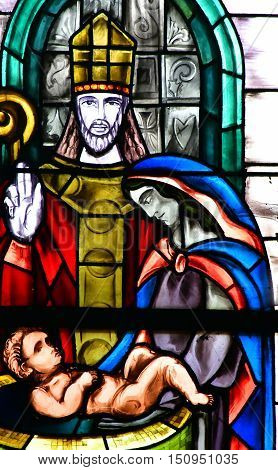 Poissy France - august 6 2016 : stained glass window of the historical collegiate church where the king Saint Louis was baptised