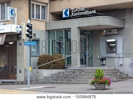 Wallisellen, Switzerland - 9 October, 2016: entrance to the Zurich Cantonal Bank office on Bahnhofstrasse street. Cantonal banks are commercial banks, which are provided with a guarantee for the assets held there by the canton in which they are based