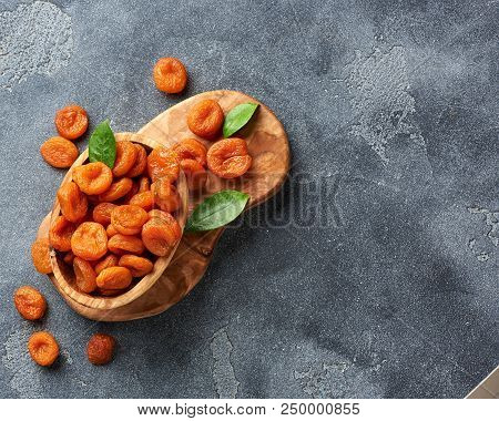 Dried Apricots On Gray Background. Witn Copy Space. Top View.
