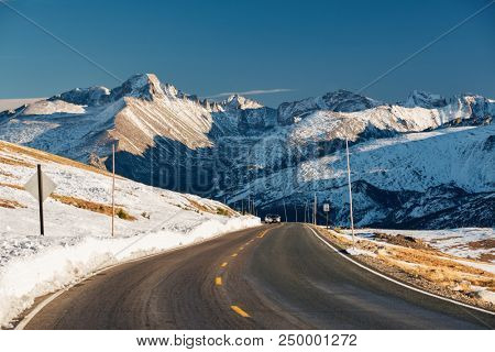 Trail Ridge Road, the highest (12,183 feet) continuous highway in the USA in high alpine tundra with rocks and mountains at autumn. Rocky Mountain National Park in Colorado, USA. 