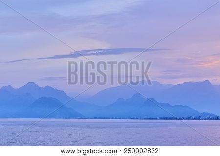 Mediterranean Sea. View Of The Sea From The Resort Town Of Kemer, Antalya, Turkey. Sunset Over The T