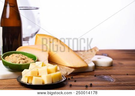 Famous Dutch Finger Food Usually Served With Glass Of Beer, Cubes Hard Old Dutch Cow And Goat Cheese