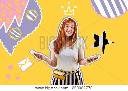 Easy Choice. Positive Friendly Shop Assistant Smiling And Holding Two Modern Smartphones While Helpi