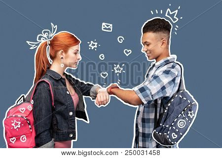 Good Watches. Two Progressive Students Standing Opposite Each Other And Feeling Confident While Look