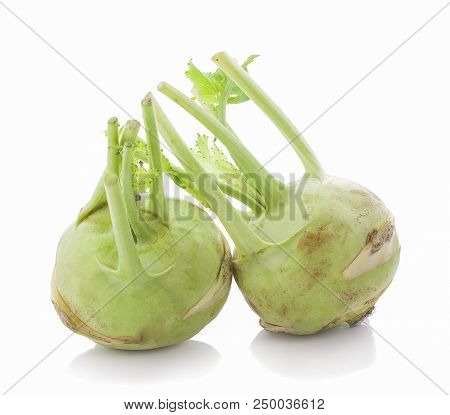 Fresh Kohlrabi With Green Leaves On Isolated White Backround