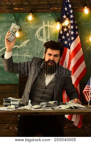 Economy And Finance. Economy Concept With Bearded Man Holding Money
