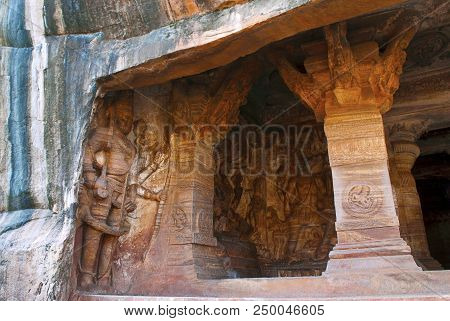 Cave 3 : View Of Verandah, From Outside. Badami Caves, Karnataka. Figures Seen From Left To Right -
