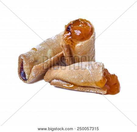Cookies Rolled With Cherries And Black Currants Isolated On A White Background. Sweet Dessert.