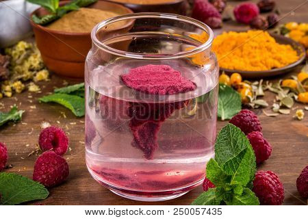 Raspberry Extract Stir In The Water Shot Close-up