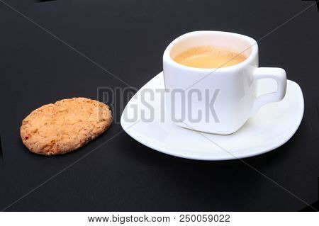 Classic Espresso In White Cup With Homemade Cake On Black Background. Selective Focus