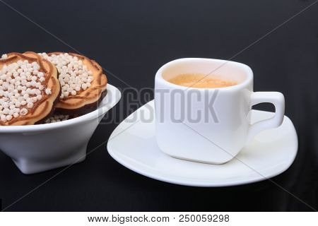 Classic Espresso In White Cup With Homemade Cake On Black Background. Selective Focus