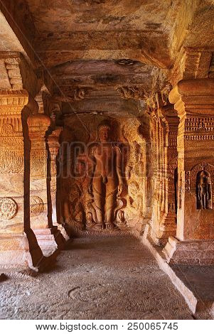 Cave 4 : Carved Figure Of Bahubali With His Lower Legs Surrounded By Snakes, Together With His Daugh