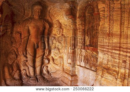 Cave 4 : Carved Figure Of Bahubali With His Lower Legs Surrounded By Snakes, Together With His Daugh