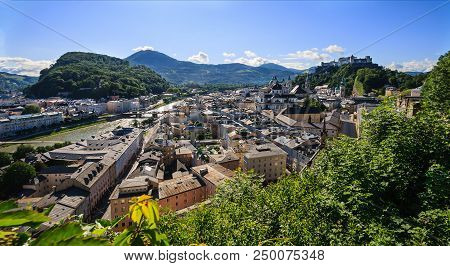 Beautiful Panoramic Summer View Of Salzburg City With Festung Hohensalzburg Castle And Salzach River