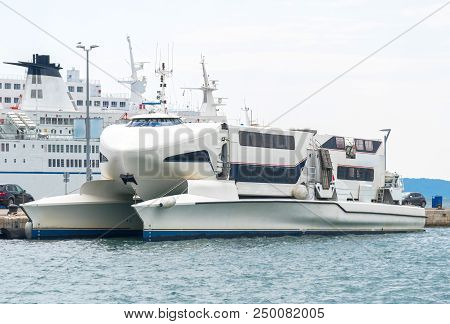 Modern High Speed Craft Moored In The Port.