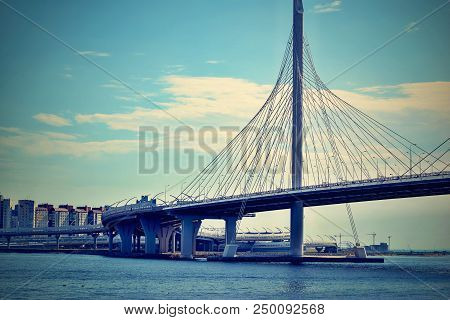 The Big Modern Cable-stayed Bridge Over The River Or Over The Gulf In St. Petersburg Against The Bac