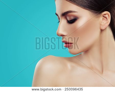 Nice Woman Face On Colorful Blue Background With Copy Space For Product Placement And Advertising Ma