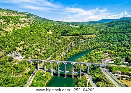 The Cize-bolozon Rail And Road Viaduct Across The Ain Gorge In France