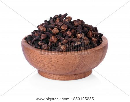 Spicy Dried Clove, Syzygium Aromaticum Flower Buds In Wooden Bowl