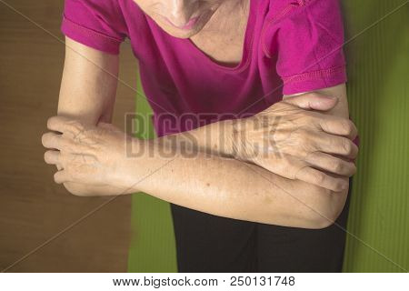 Rehabilitation Exercises For An Older Woman With Cerebral Stroke