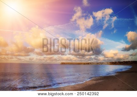 Beautiful Sealandscape With Dramatic Clouds Over Blue Sky And Soft Waves. Beauty World Natural Outdo