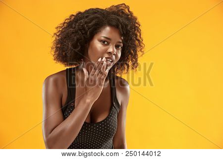 Secret, Gossip Concept. Young Woman Whispering A Secret Behind Her Hand. Business Woman Isolated On 