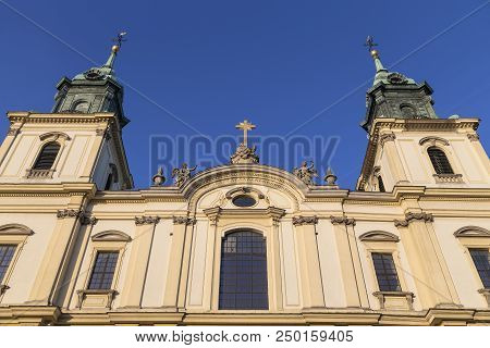 Detail Of Facade Of The Basilica Of The Holy Cross. Warsaw. Poland